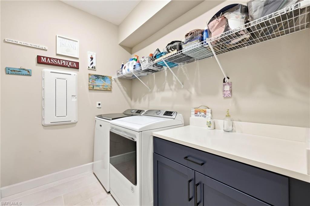 2094 Grove Drive Naples, FL 34120 - Photo 23 of 40 a utility room with a sink dryer and washer
