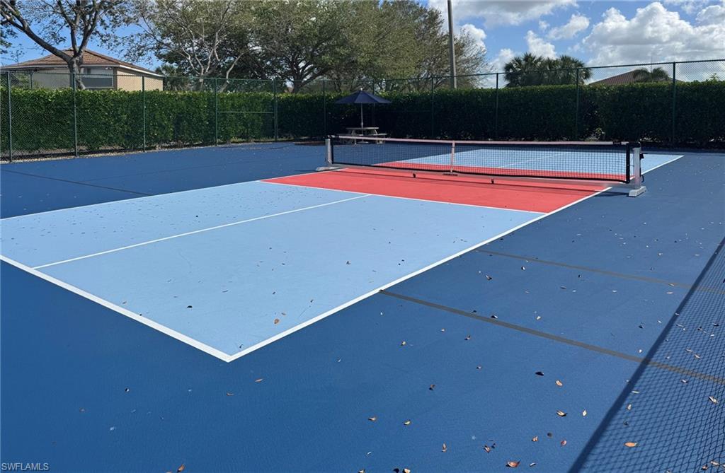 2094 Grove Drive Naples, FL 34120 - Photo 40 of 40 a view of a tennis court