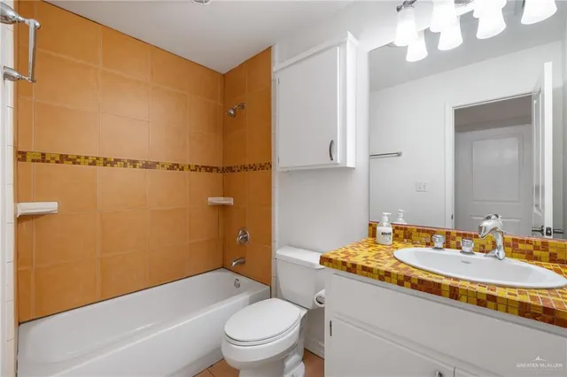 a utility room with cabinets