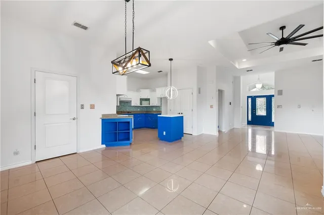 a view of a yard in front of a house with a garden