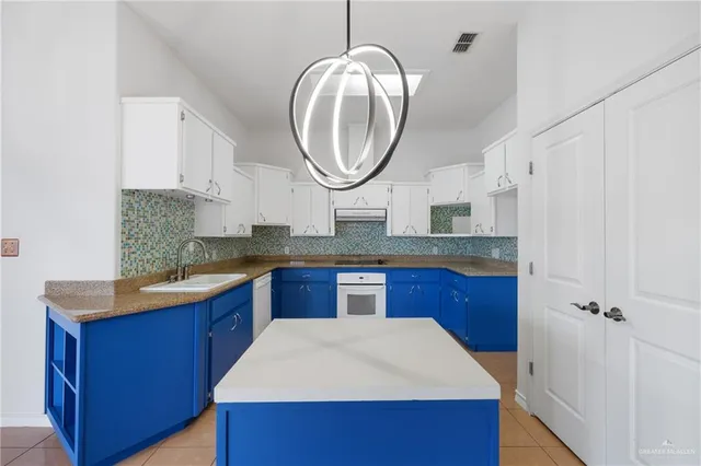 a view of kitchen and windows