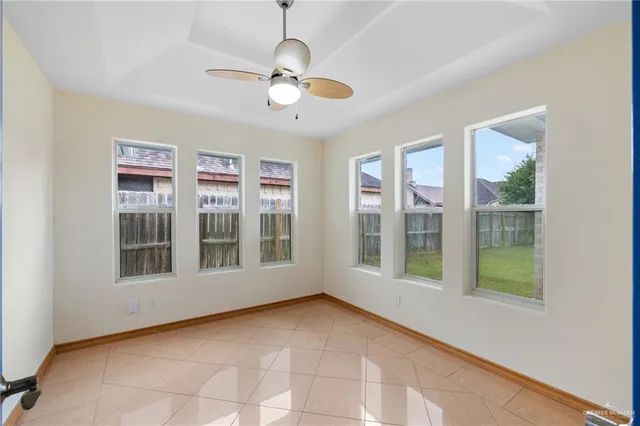 a large kitchen with stainless steel appliances a sink stove and a granite counter top