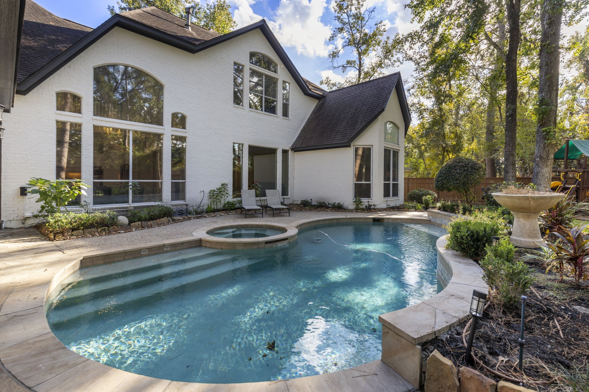 90 West Horizon Ridge Place Spring, TX 77381 - Photo 36 of 36 a view of a house with swimming pool