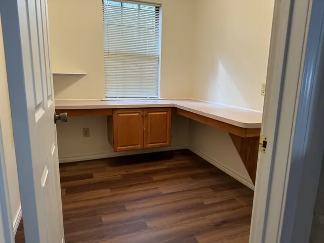 a kitchen with a sink and a window