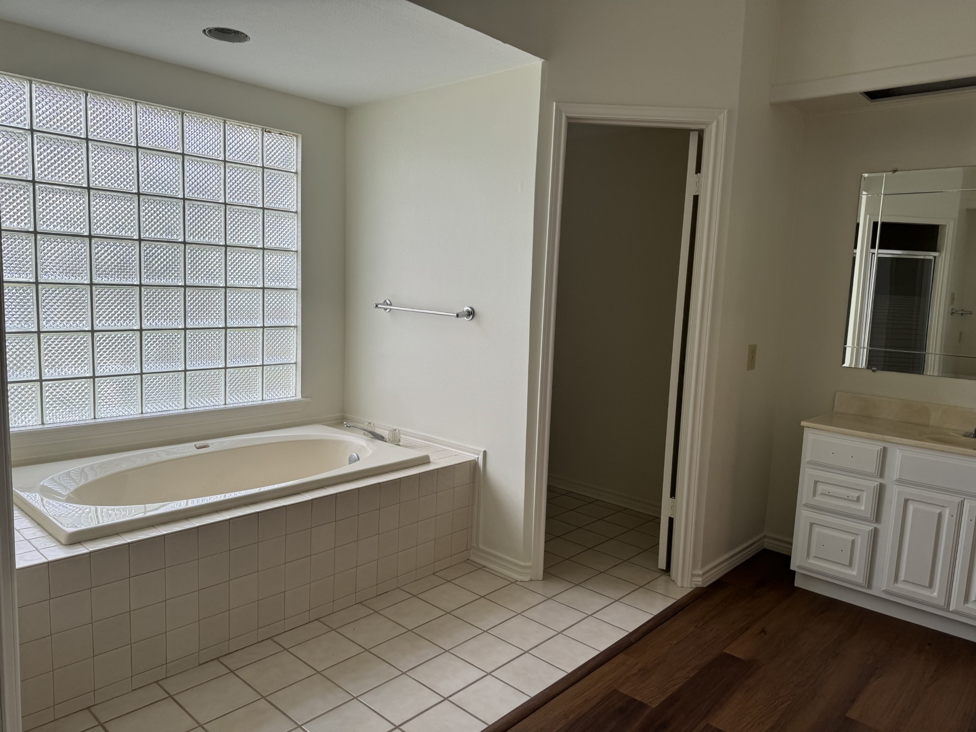 12223 A Old Huffmeister Road Cypress, TX 77429 - Photo 25 of 31 a spacious bathroom with a bathtub and a shower