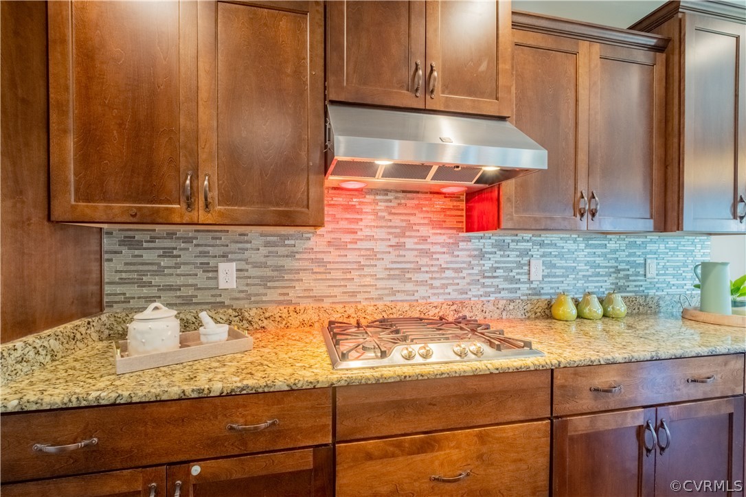 4935 Turner Ridge Court Glen Allen, VA 23059 - Photo 11 of 50 a kitchen with granite countertop cabinets and stainless steel appliances