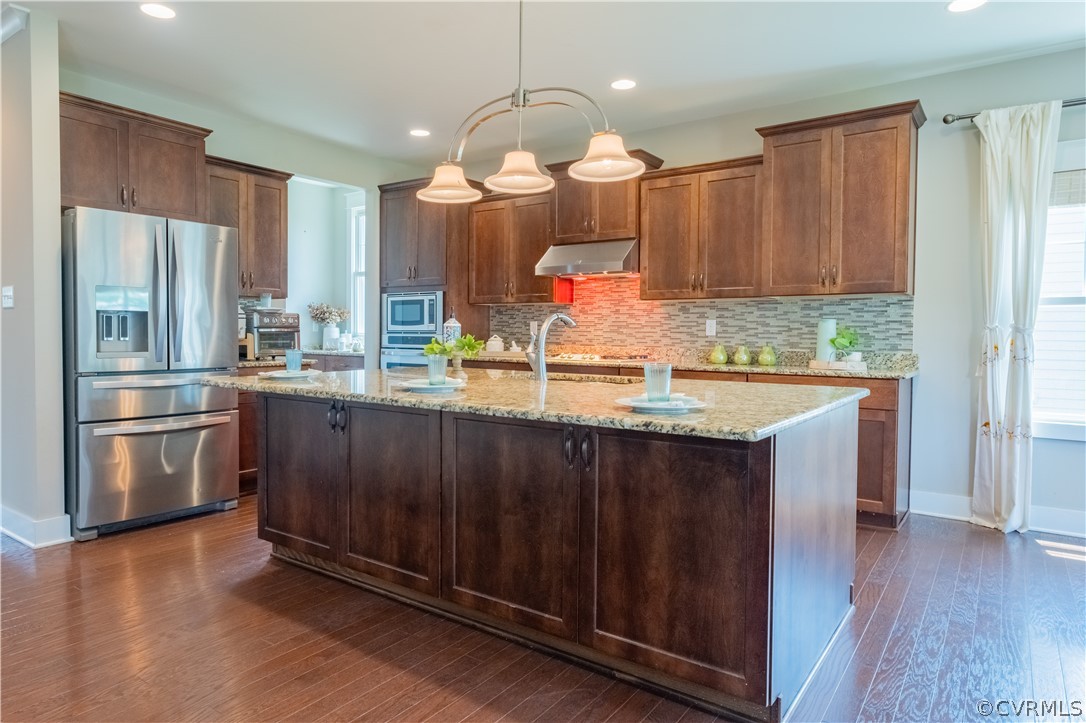 4935 Turner Ridge Court Glen Allen, VA 23059 - Photo 12 of 50 a kitchen with a sink cabinets and wooden floor