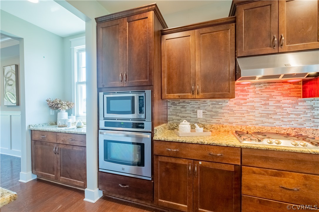 4935 Turner Ridge Court Glen Allen, VA 23059 - Photo 13 of 50 a kitchen with granite countertop cabinets and oven
