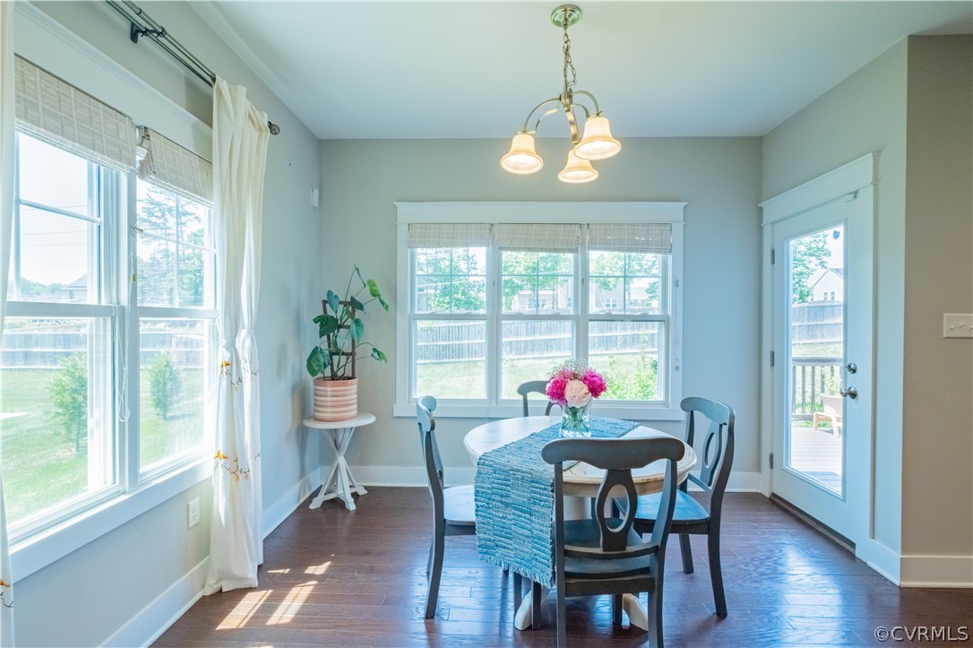 4935 Turner Ridge Court Glen Allen, VA 23059 - Photo 15 of 50 a view of a dining room with furniture window and wooden floor