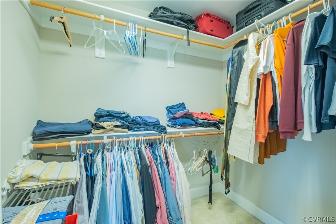 4935 Turner Ridge Court Glen Allen, VA 23059 - Photo 32 of 50 a view of walk in closet with clothes and shoes