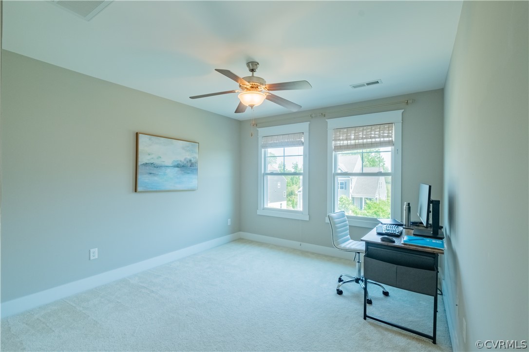 4935 Turner Ridge Court Glen Allen, VA 23059 - Photo 37 of 50 a room with chandelier fan and windows
