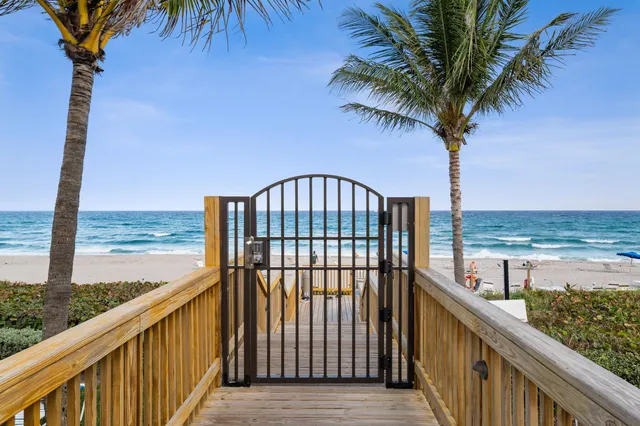 a view of a balcony with ocean view