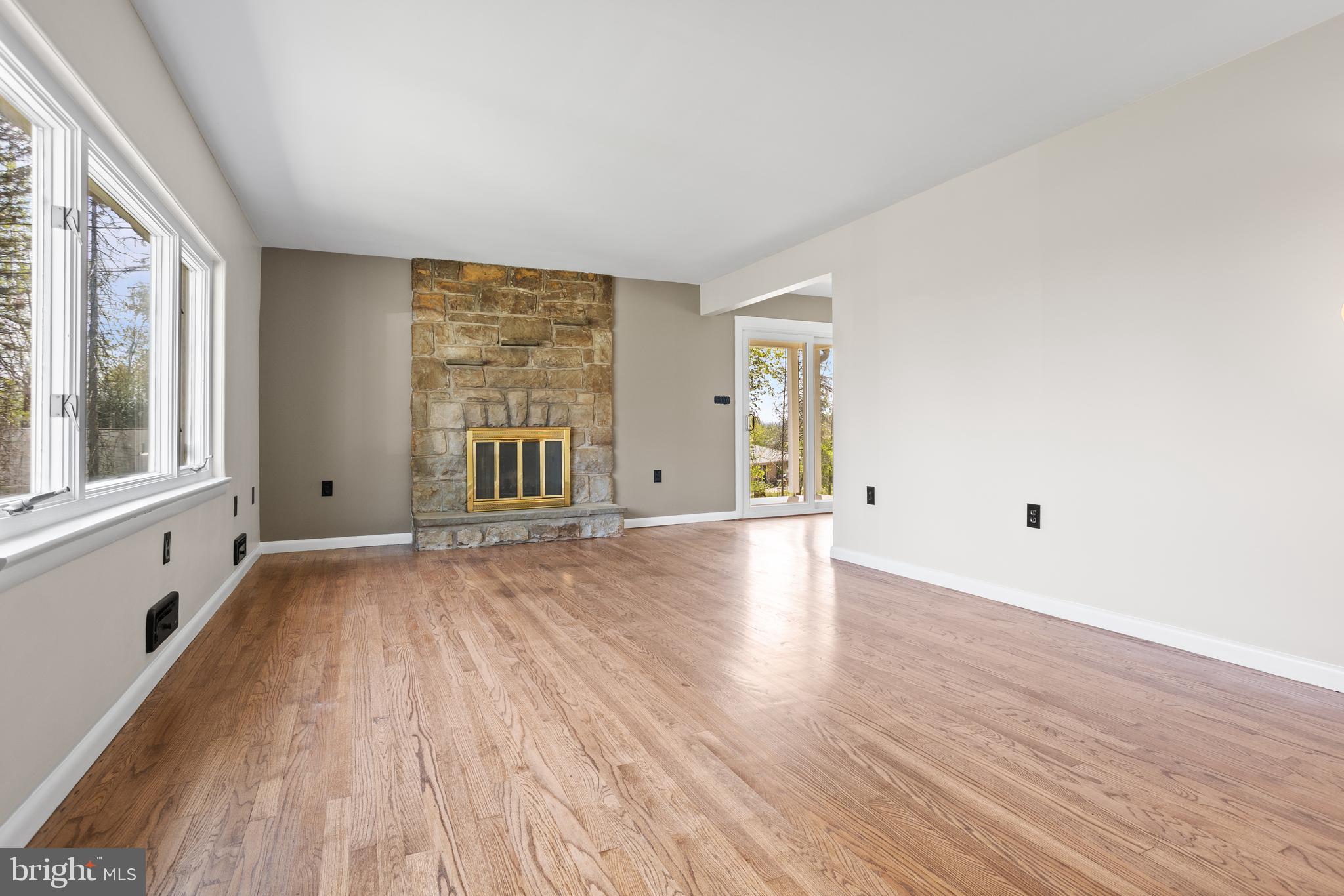330 Church Lane Road Reading, PA 19606 - Photo 5 of 33 a view of an empty room with wooden floor and a window