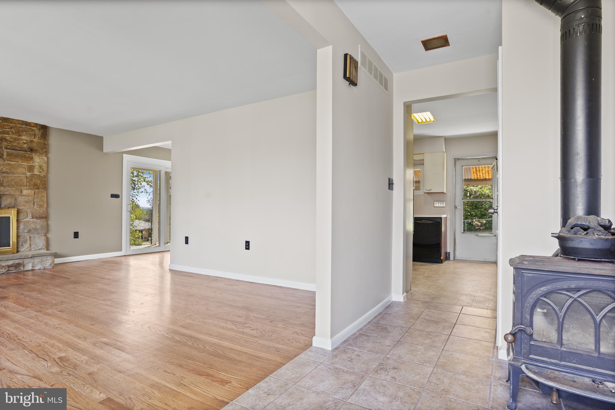 330 Church Lane Road Reading, PA 19606 - Photo 7 of 33 a view of a livingroom with wooden floor and furniture