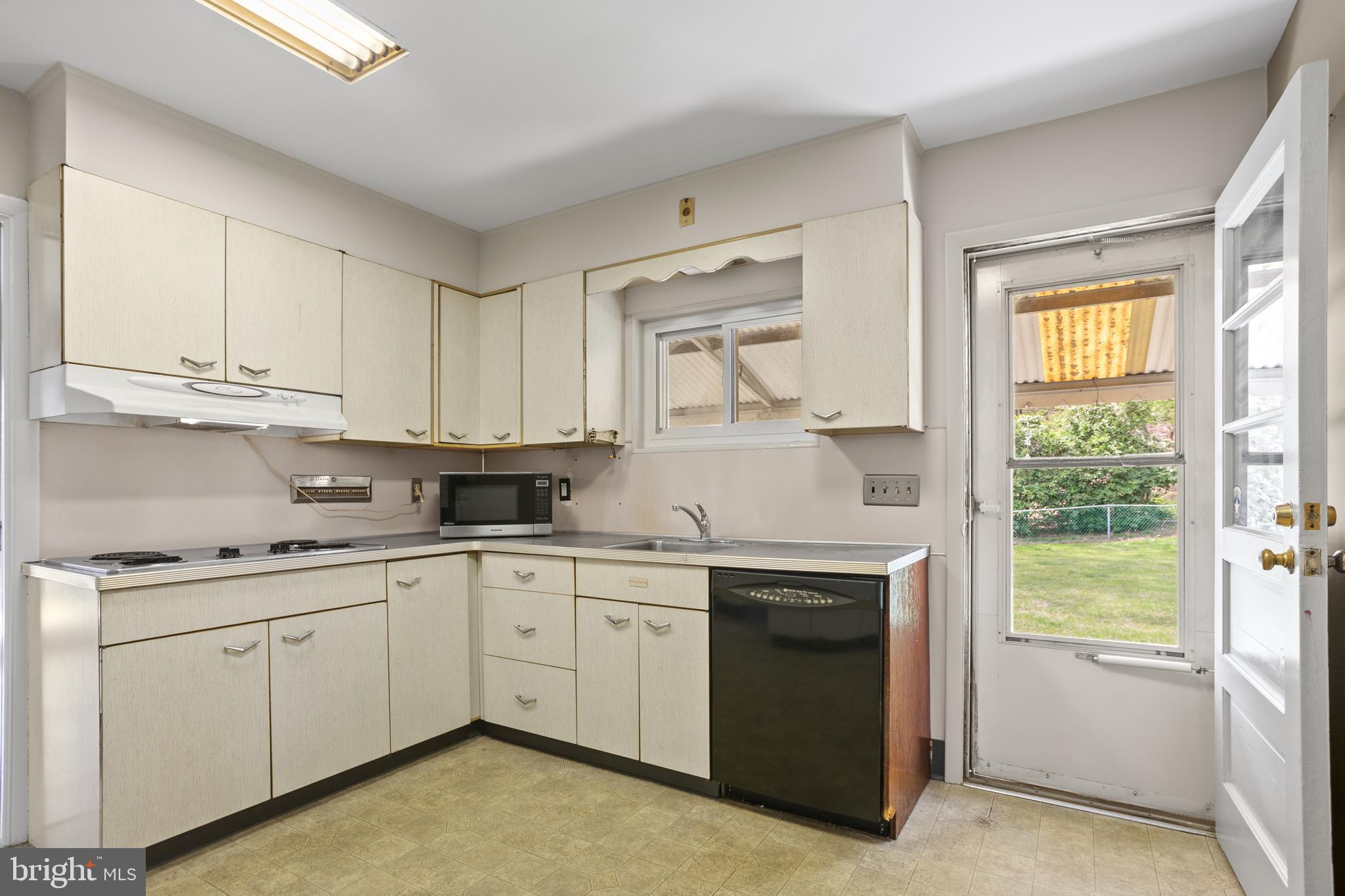 330 Church Lane Road Reading, PA 19606 - Photo 10 of 33 a kitchen with a sink cabinets and window