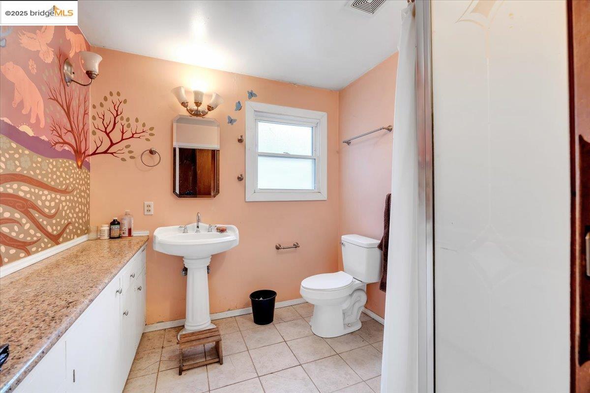 25300 Italian Bar Road Columbia, CA 95310 - Photo 15 of 60 a bathroom with a sink and a mirror