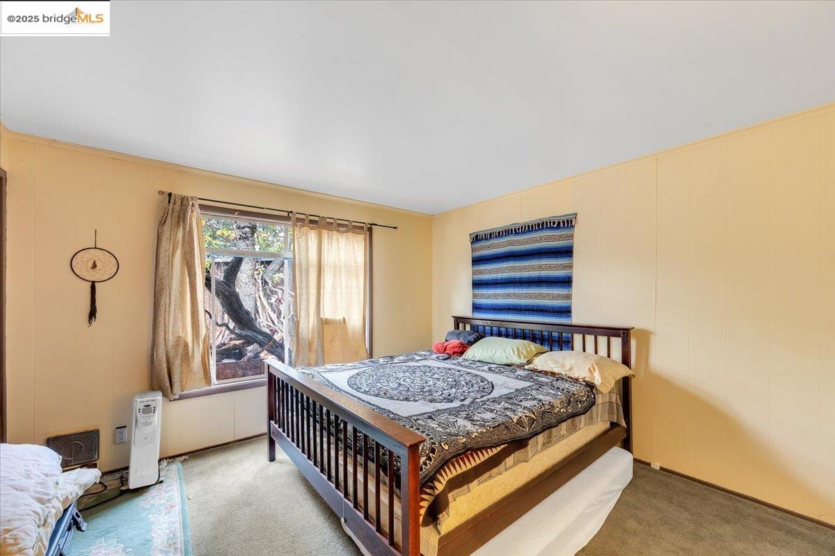 25300 Italian Bar Road Columbia, CA 95310 - Photo 16 of 60 a bedroom with a bed and a window