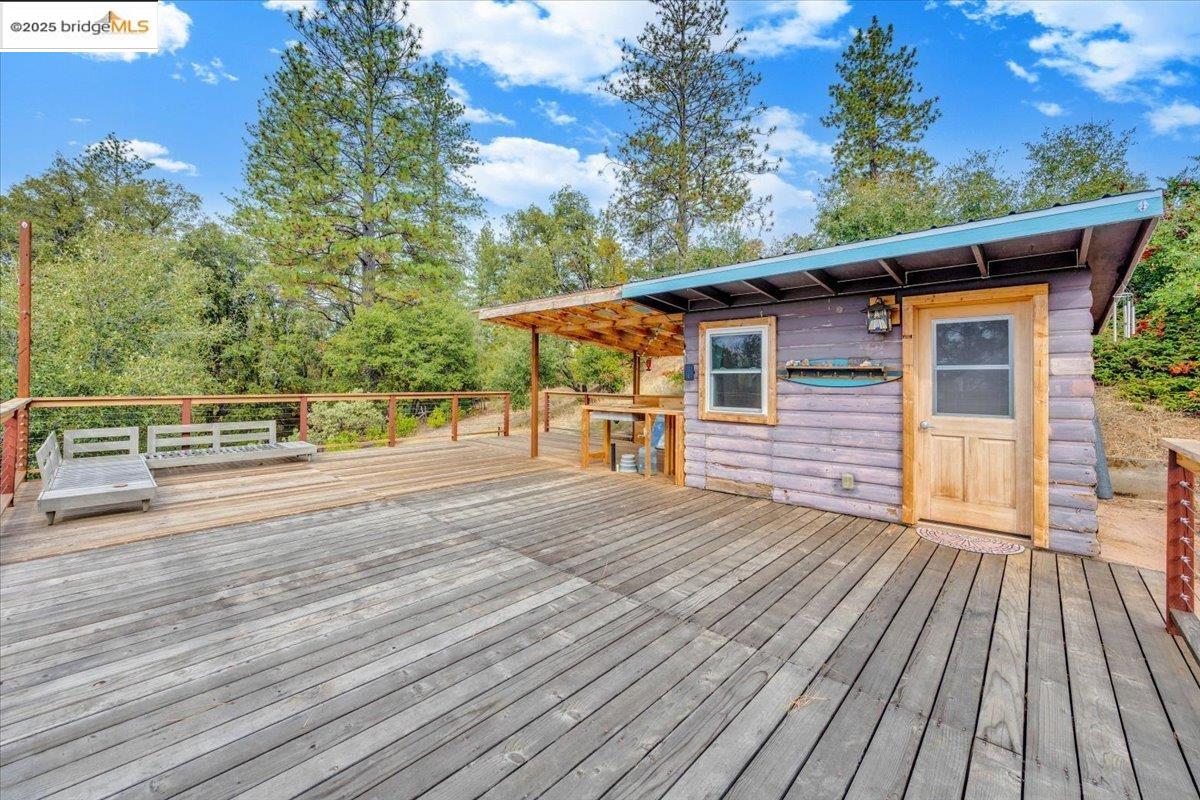 25300 Italian Bar Road Columbia, CA 95310 - Photo 20 of 60 a view of outdoor space with deck and yard