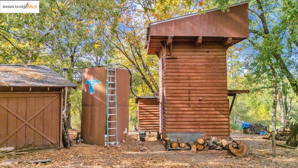 25300 Italian Bar Road Columbia, CA 95310 - Photo 27 of 60 a view of a house with a door