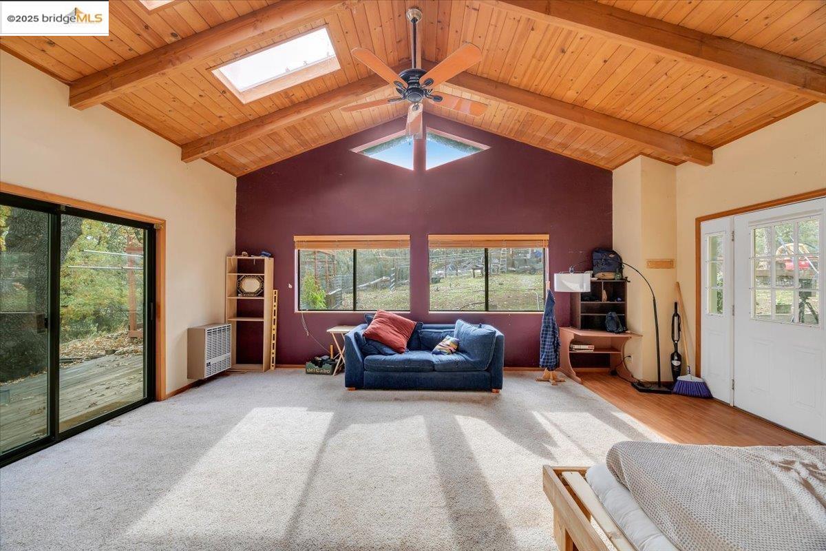25300 Italian Bar Road Columbia, CA 95310 - Photo 35 of 60 a bedroom with furniture and large windows