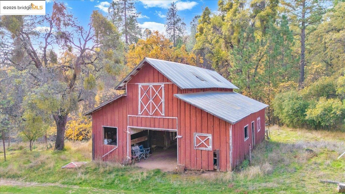 25300 Italian Bar Road Columbia, CA 95310 - Photo 41 of 60 a view of a house with a yard