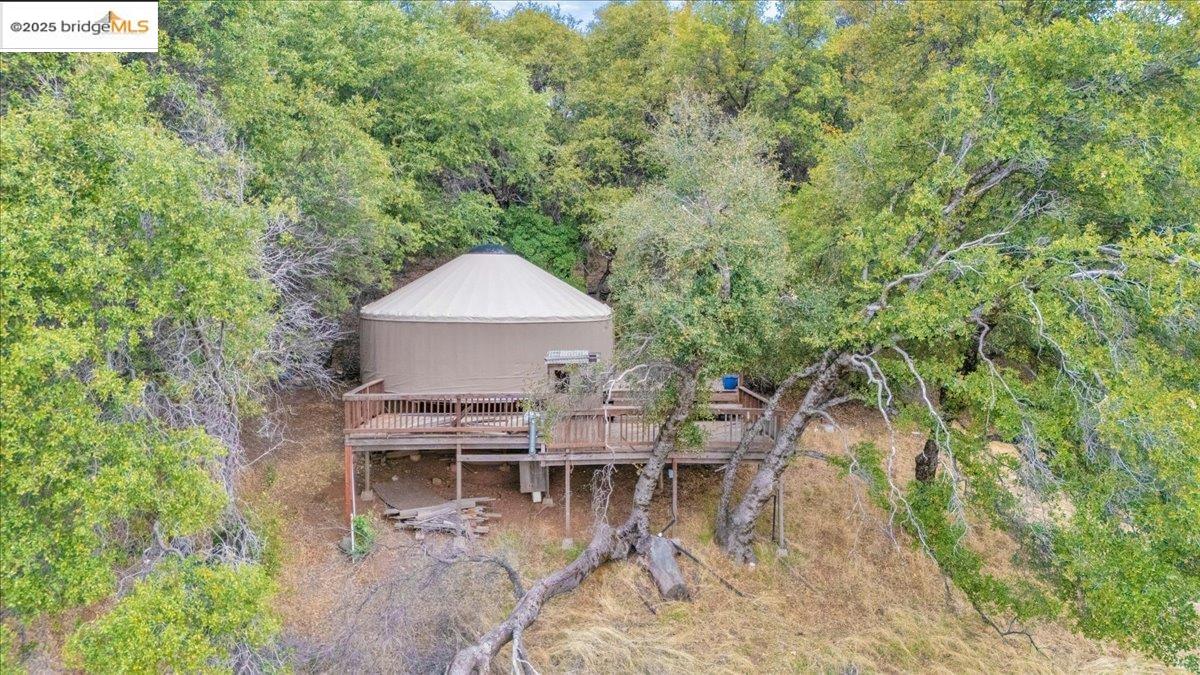 25300 Italian Bar Road Columbia, CA 95310 - Photo 47 of 60 a view of a chairs and table in the patio