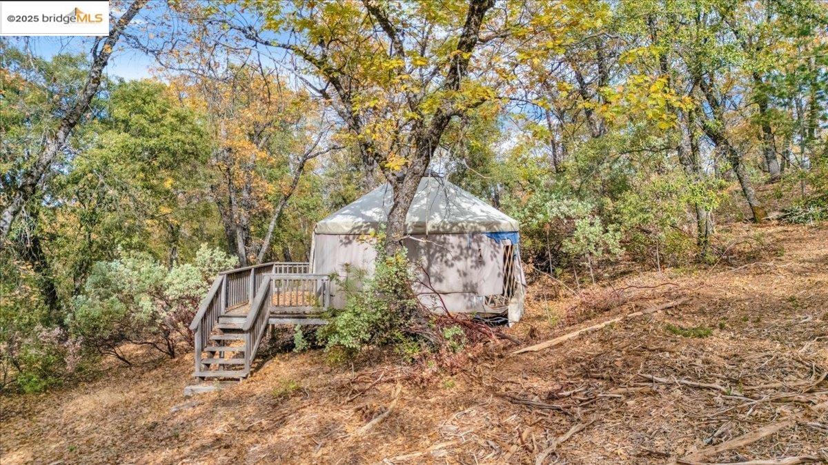 25300 Italian Bar Road Columbia, CA 95310 - Photo 50 of 60 a view of a house with a yard