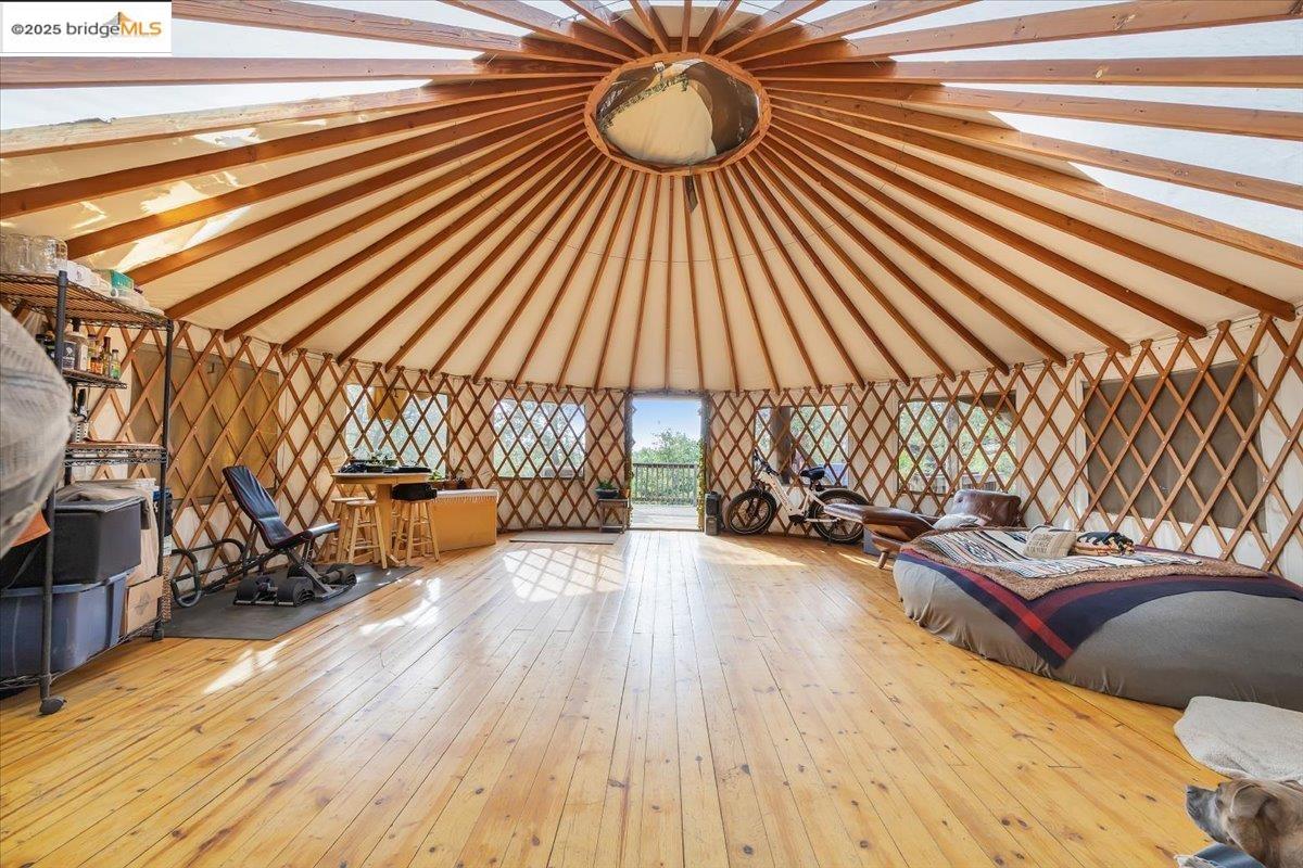 25300 Italian Bar Road Columbia, CA 95310 - Photo 53 of 60 a view of a room with wooden floor and furniture