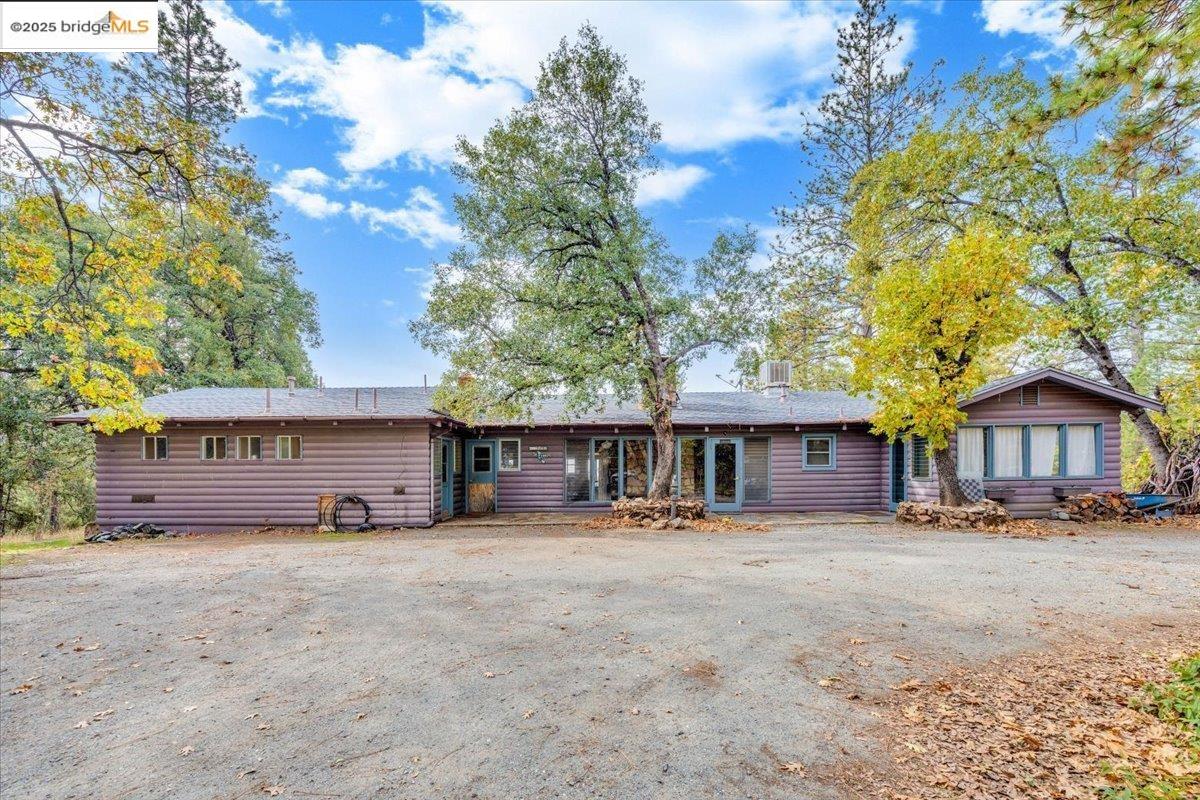 25300 Italian Bar Road Columbia, CA 95310 - Photo 6 of 60 front view of a house with a yard