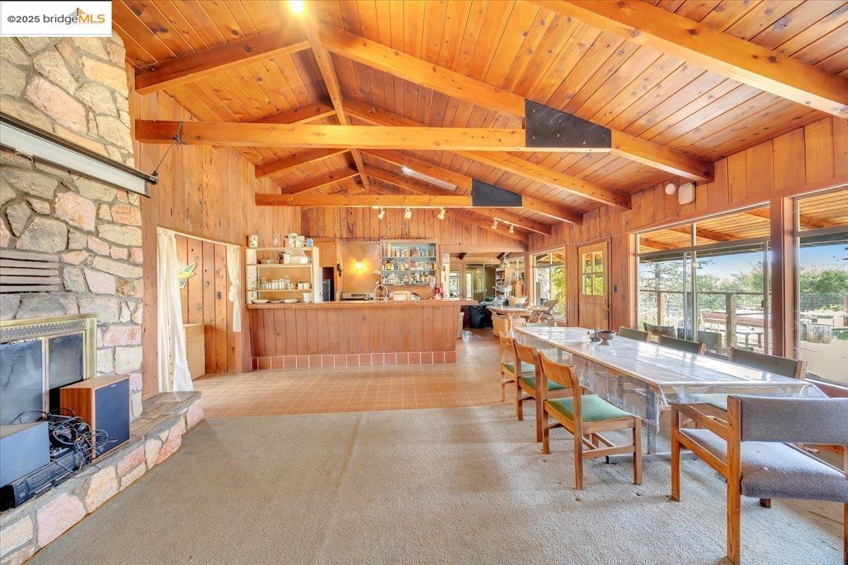 25300 Italian Bar Road Columbia, CA 95310 - Photo 8 of 60 a view of a patio with a table and chairs and potted plants