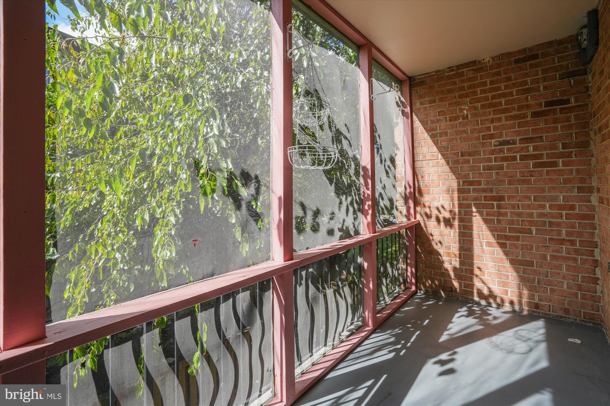 3382 Hewitt Avenue, Unit 201 Silver Spring, MD 20906 - Photo 25 of 32 Enclosed screened balcony