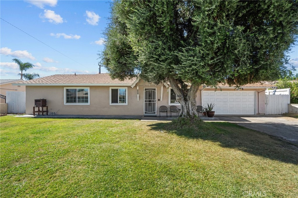 6710 Yucca Avenue Rialto, CA 92376 - Photo 1 of 1 a view of a house with a yard