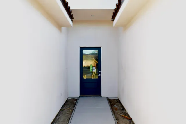 a view of hallway with stairs