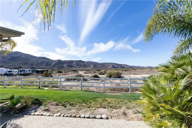 a view of a garden with a lake