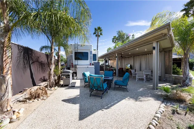 a view of a swimming pool with a patio