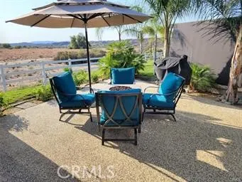 a view of balcony with furniture