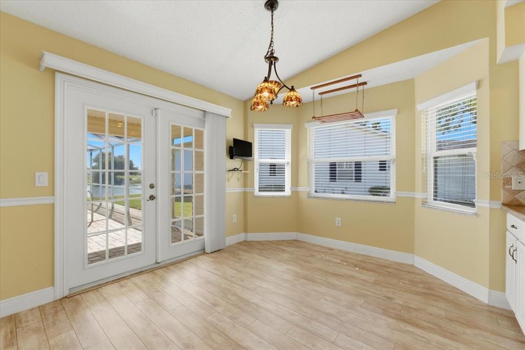 3650 Wildcat Run Lakeland, FL 33810 - Photo 11 of 59 a view of an room with wooden floor and windows