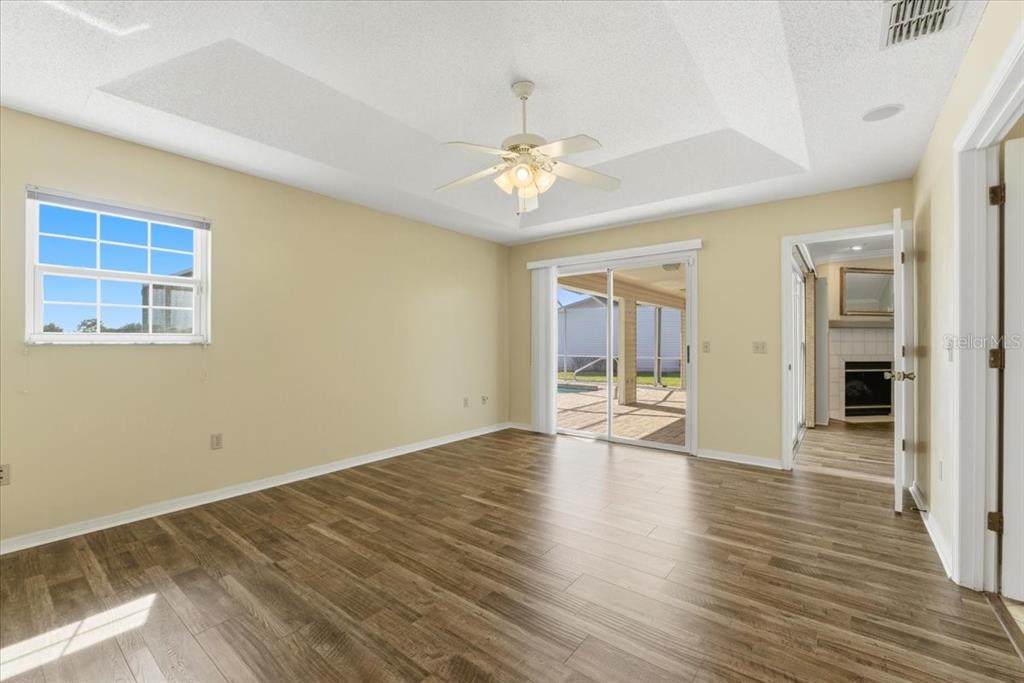 3650 Wildcat Run Lakeland, FL 33810 - Photo 19 of 59 wooden floor in an empty room with a window
