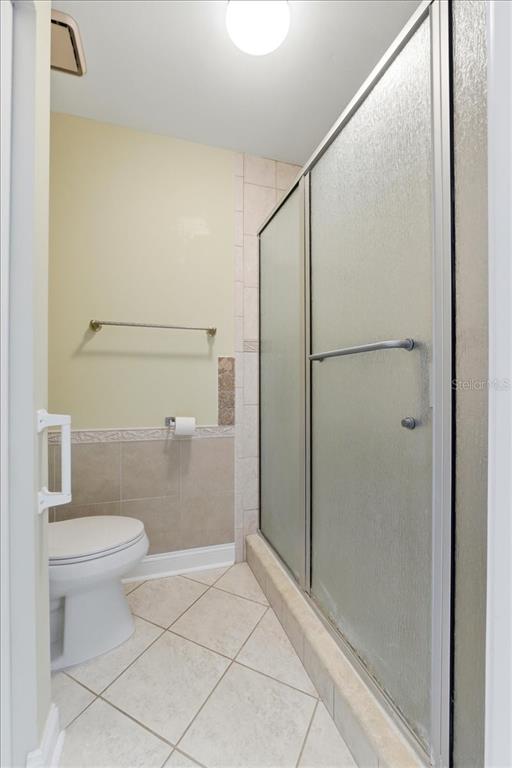 3650 Wildcat Run Lakeland, FL 33810 - Photo 24 of 59 a bathroom with a granite countertop shower and a toilet