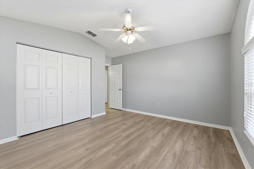 3650 Wildcat Run Lakeland, FL 33810 - Photo 27 of 59 a view of an empty room with wooden floor