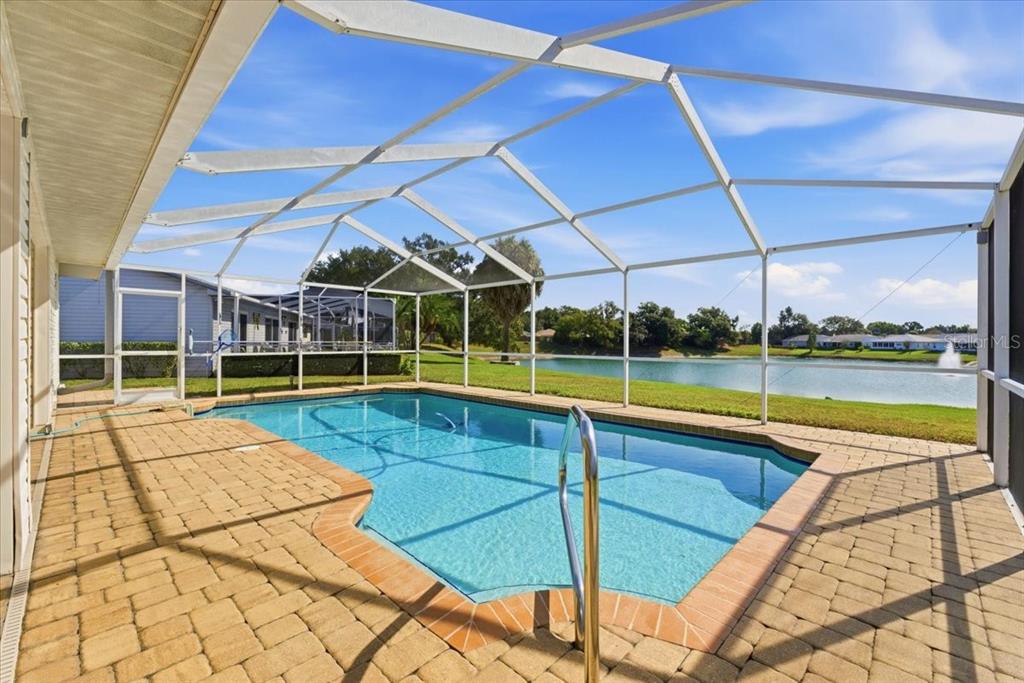 3650 Wildcat Run Lakeland, FL 33810 - Photo 35 of 59 a view of a swimming pool with a porch