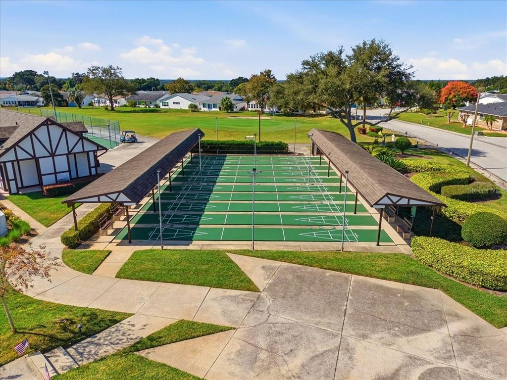 3650 Wildcat Run Lakeland, FL 33810 - Photo 54 of 59 a view of a tennis ground with large trees