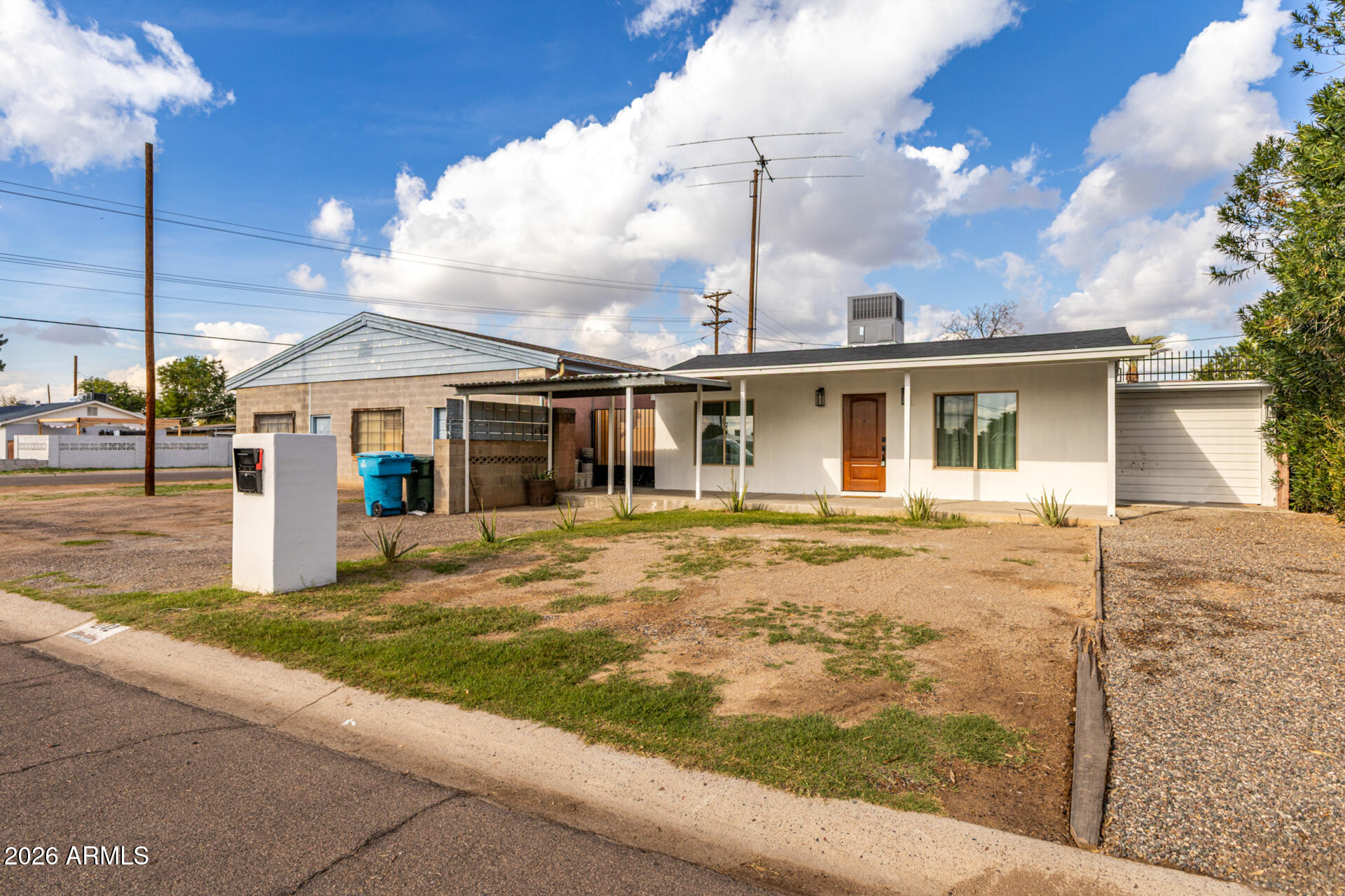 2142 West Coolidge Street Phoenix, AZ 85015 - Photo 2 of 28 a front view of house with yard