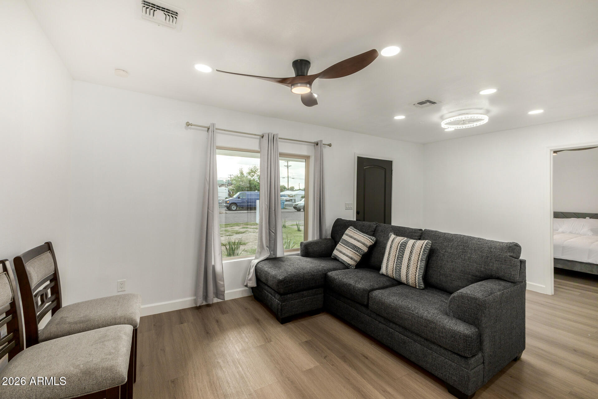 2142 West Coolidge Street Phoenix, AZ 85015 - Photo 24 of 28 a living room with furniture and a large window