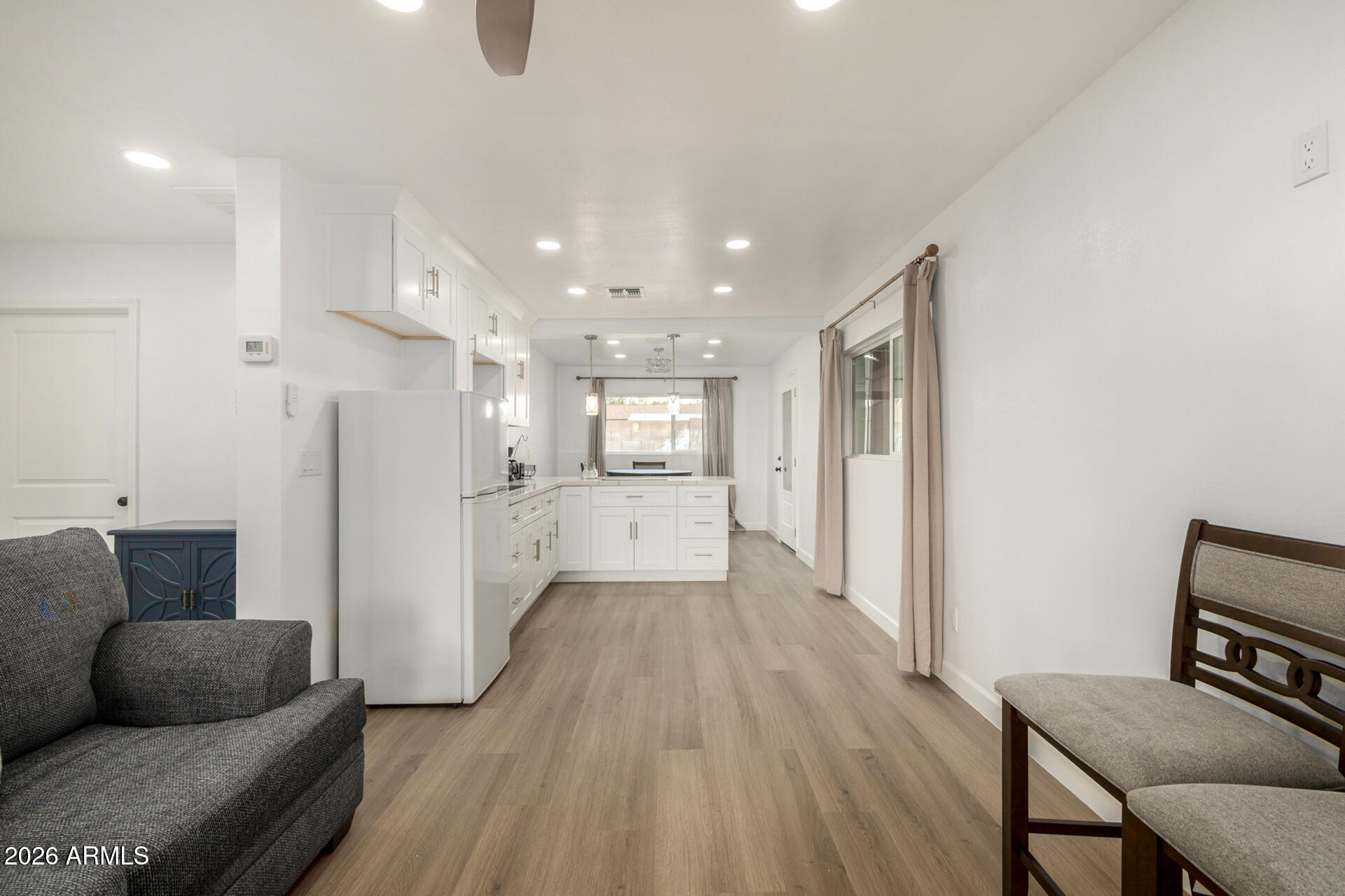 2142 West Coolidge Street Phoenix, AZ 85015 - Photo 25 of 28 a view of kitchen with furniture and wooden floor