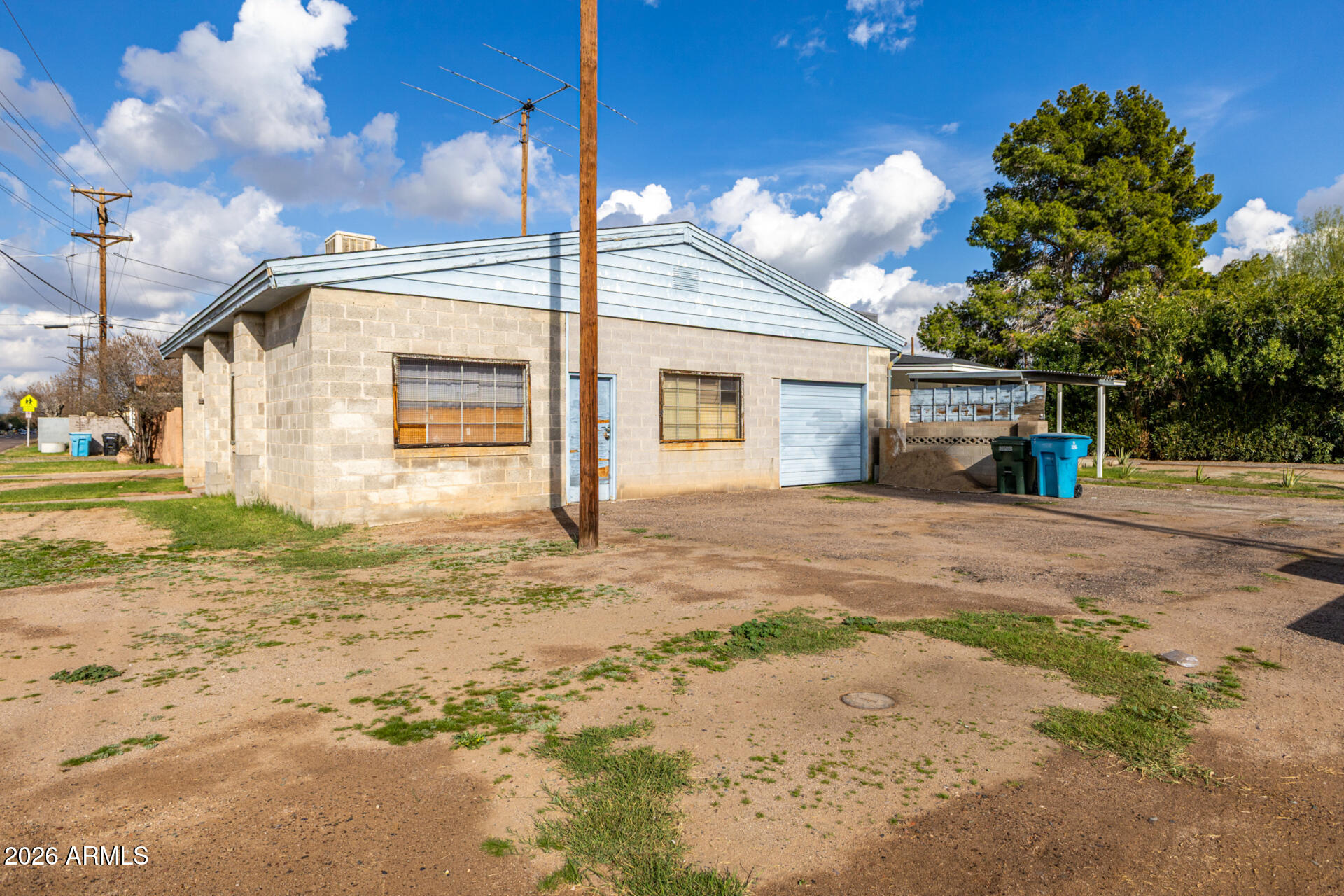 2142 West Coolidge Street Phoenix, AZ 85015 - Photo 8 of 28 a view of a house with a backyard
