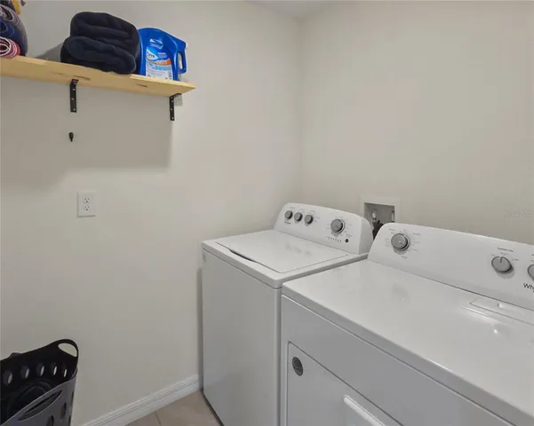 a view of a big room with yard from balcony