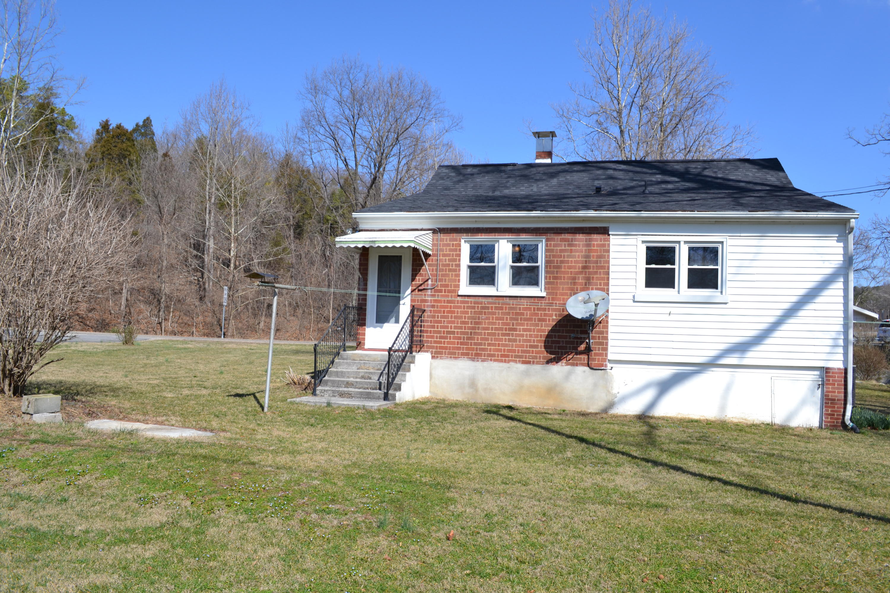 31 Mountain Pass Road Blue Ridge, VA 24064 - Photo 40 of 40 a front view of a house with garden