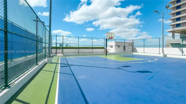 a view of a large swimming pool and outdoor space