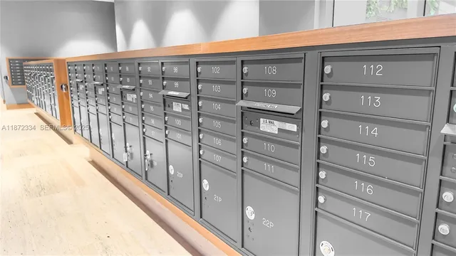 a view of swimming pool with palm trees